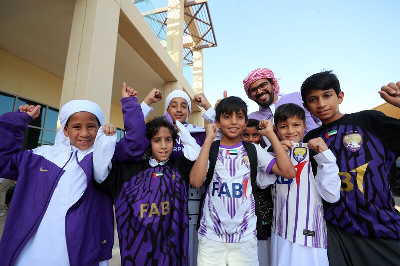 Al Ain fans gather before the game at Hazza bin Zayed Stadium. 