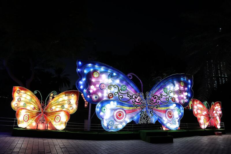 DUBAI, UNITED ARAB EMIRATES , October 14 – 2020 :- View of the colourful light figures at the Dubai Garden Glow season 6 which opened on 12th October at the Zabeel park in Dubai. No sitting allowed on the benches as a precautionary measure against the spread of coronavirus. Security at the entrance gate checks the body temperature of all the visitors. (Pawan Singh / The National) For Life Style/Online/Instagram/Big Picture. Story by Evelyn Lau