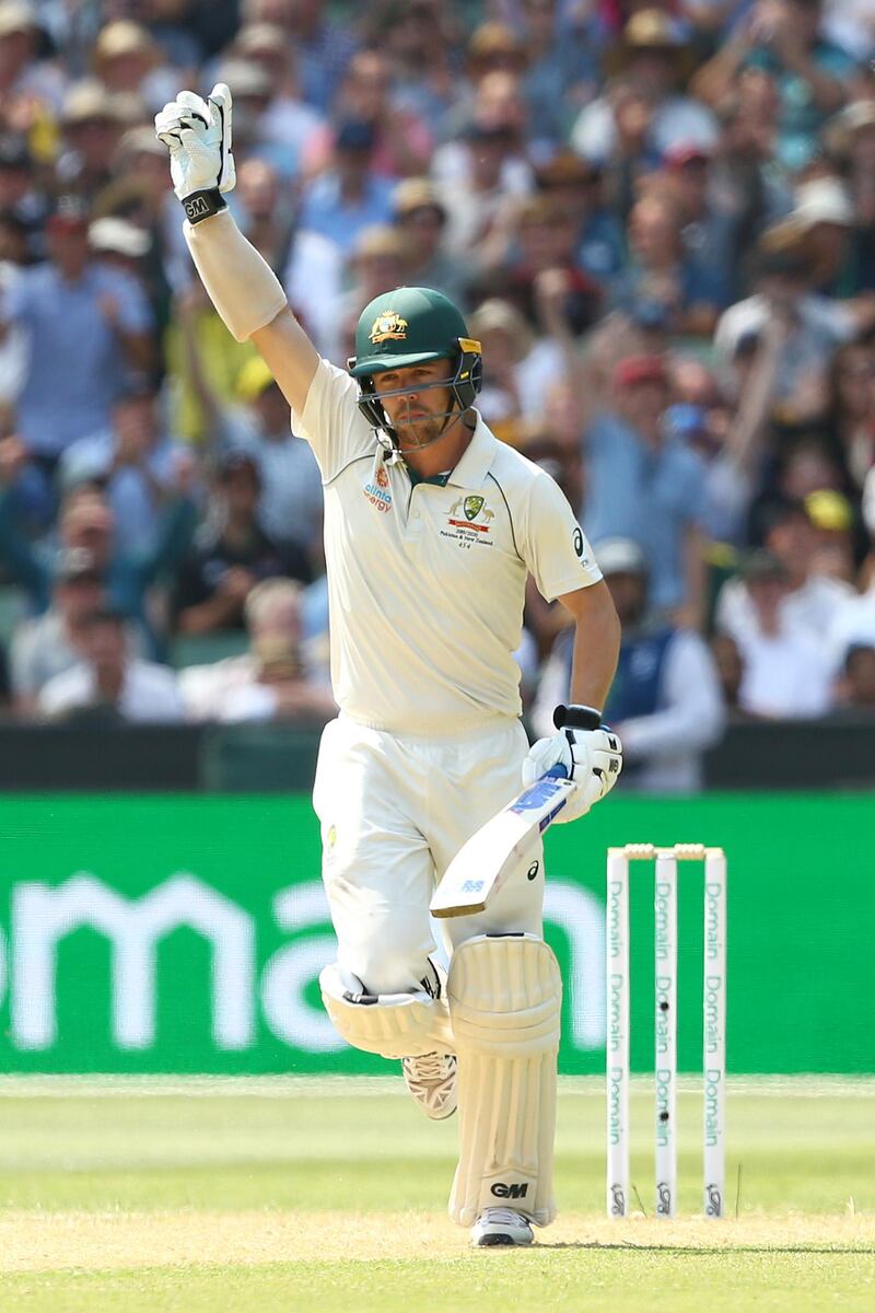 Travis Head celebrates after scoring a century on day two of the second Test against New Zealand in Melbourne on Friday. Getty Images