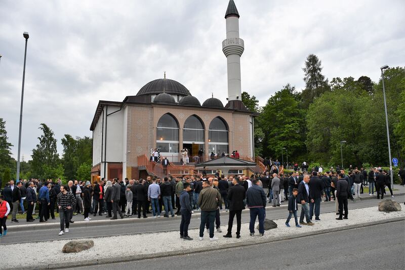 Muslims greet each other after performing Eid Al Fitr prayer at Fittja Mosque in Stockholm. A study found people with Arabic-sounding names faced discrimination in the Swedish housing market. Getty