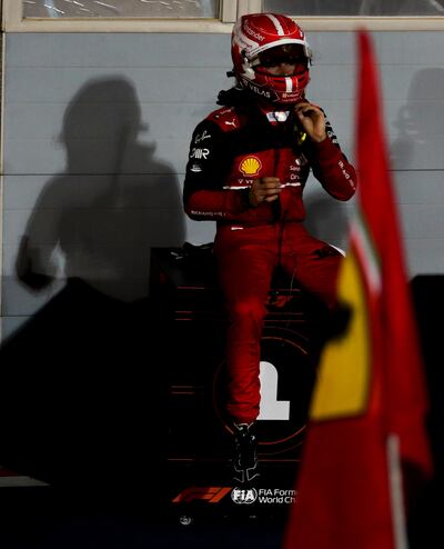 First place winner Monaco's Formula One driver Charles Leclerc of Scuderia Ferrari Mission Winnow celebrates with the trophy after winning the Formula One Grand Prix of Bahrain at the Bahrain International Circuit in Sakhir, Bahrain, 20 March 2022.   EPA / ALI HAIDER