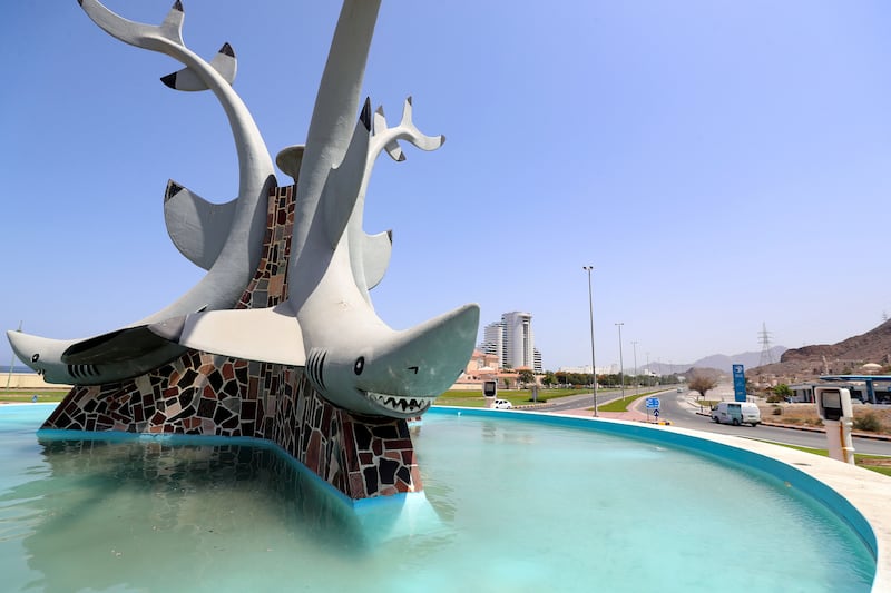 Sharks keep an eye on passing motorists from this roundabout in close to the Al Aqah hotels in Fujairah.