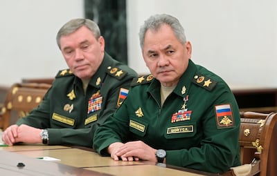 Russian Defence Minister Sergey Shoigu, right, and First Deputy Defence Minister Valery Gerasimov at a meeting with President Vladimir Putin in Moscow on February 27. AP