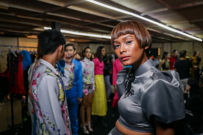 A model poses backstage during Kuala Lumpur Fashion Week 2022 in Pavilion, Malaysia. Getty Images