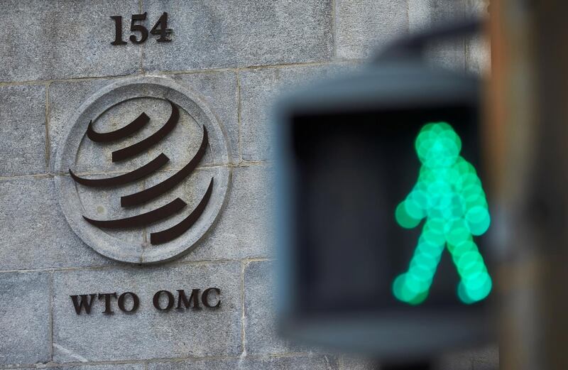 FILE PHOTO: A logo is pictured in front of the World Trade Organization (WTO) in Geneva, Switzerland, July 22, 2020. REUTERS/Denis Balibouse/File Photo