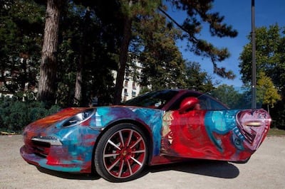 Shalimar Sharbatly, part of the 'Moving Art' school, hand-paints customised sports cars. Courtesy the artist