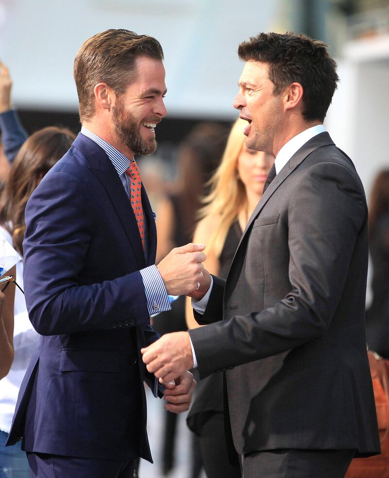 Actors Chris Pine (L) and Karl Urban, cast members of the new film "Star Trek Into Darkness", greet each other as they arrive at the film's premiere in Hollywood May 14, 2013. REUTERS/Fred Prouser (UNITED STATES - Tags: ENTERTAINMENT) *** Local Caption ***  LAB35_USA-_0515_11.JPG