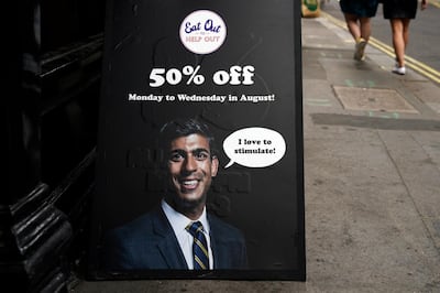 epa08601388 A sign advertising 'Eat Out to Help Out' scheme by Chancellor of the Exchequer Rishi Sunak near Oxford Street, Central London, Britain, 13 August 2020. According to news reports, the UK is now officially in recession. Britain is set to experience its worst recession on record after data showed the Coronavirus sent the UK economy plunging by over twenty percent for the second quarter of 2020.  EPA/WILL OLIVER