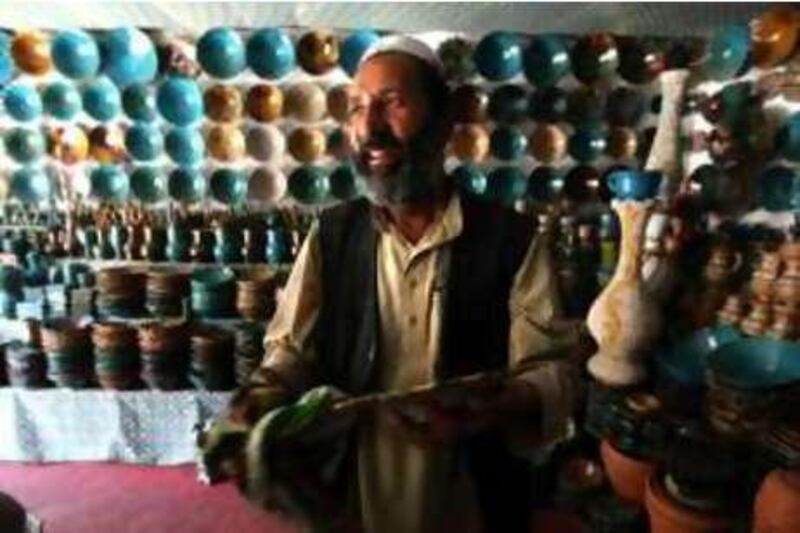 June 6, 2008 / Istalif /  Malik Mohammad owns this pottery shop in Istalif Afghanistan. During the Telaban's rule pottery shops in Istalif where destroyed, but with the help of the Turquoise Mountain Foundation the shops have returned June 6, 2008. (Sammy Dallal / The National) *** Local Caption ***  sd-afghanday4-3.jpg sd-afghanday4-3.jpg