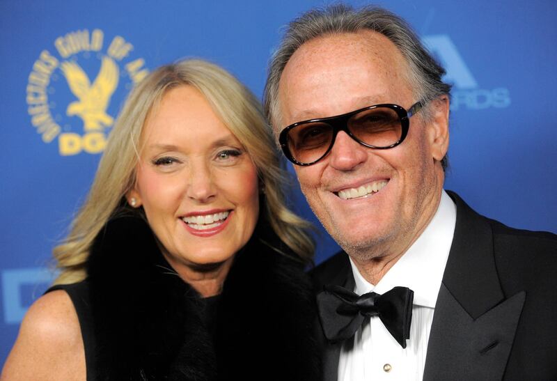 Peter Fonda and wife Margaret DeVogelaere arrive at the 65th annual Directors Guild of America Awards in Los Angeles in 2013. AP.