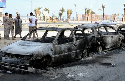 Vehicles destroyed in clashes between soldiers loyal to Libya's disputed Prime Minister Abdul Hamid Dbeibah and rival forces, in Tripoli. Reuters