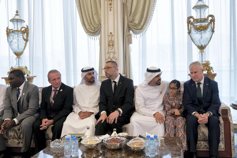 ABU DHABI, UNITED ARAB EMIRATES - October 07, 2019: HH Sheikh Theyab bin Mohamed bin Zayed Al Nahyan, Chairman of the Department of Transport, and Abu Dhabi Executive Council Member (3rd R), HE Arthur Spyrou, Ambassador of Australia to the UAE (4th R), HH Sheikh Mohamed bin Hamad bin Tahnoon Al Nahyan (5th R), HH Sheikha Shamma bint Khaled bin Mohamed bin Zayed Al Nahyan (2nd R) and participants in the 26th Abu Dhabi World Road Congress, attend a Sea Palace barza.

( Mohamed Al Hammadi / Ministry of Presidential Affairs )
---