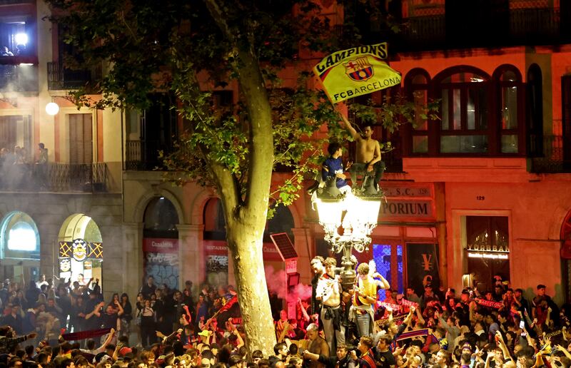 Barcelona fans celebrate in La Ramblas after winning La Liga. Reuters