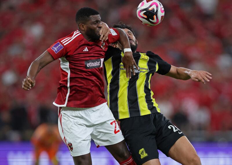 Al Ahly's Anthony Modeste fouls Al Ittihad's Ahmed Hegazy and is later sent off. Reuters