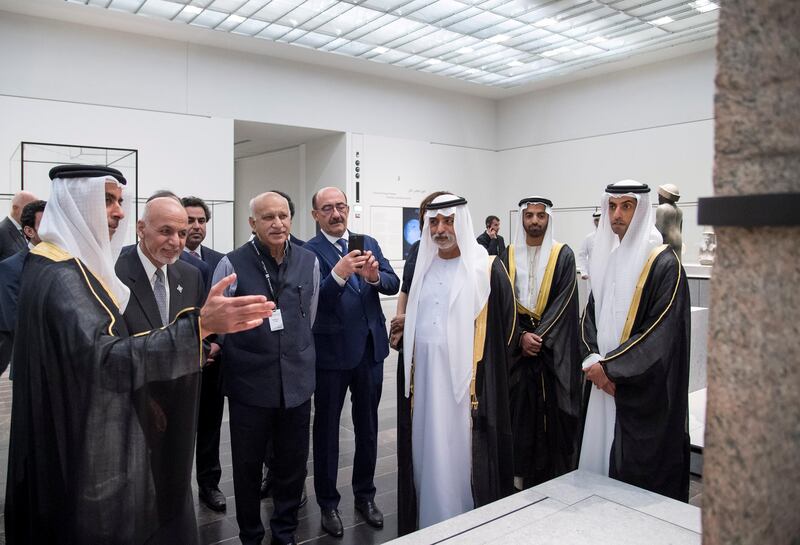 SAADIYAT ISLAND, ABU DHABI, UNITED ARAB EMIRATES - November 08, 2017: HH Sheikh Khaled bin Zayed Al Nahyan, Chairman of the Board of Zayed Higher Organization for Humanitarian Care and Special Needs (ZHO) (R), HH Sheikh Mohamed bin Saud bin Saqr Al Qasimi, Crown Prince and Deputy Ruler of Ras Al Khaimah (2nd R), HH Sheikh Nahyan bin Mubarak Al Nahyan, UAE Minister of State for Tolerance (3rd R), HH Lt General Sheikh Saif bin Zayed Al Nahyan, UAE Deputy Prime Minister and Minister of Interior (L), HE Ashraf Ghani, President of Afghanistan (2nd L), and other dignitaries, tour the LouvreAD.
( Omar Al Askar for Crown Prince Court - Abu Dhabi )
---