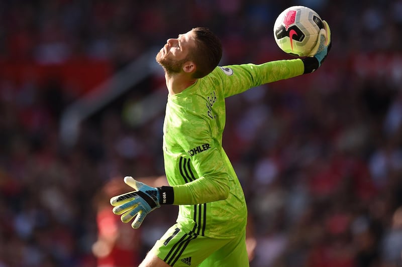 Manchester United goalkeeper David de Gea throws the ball. AFP