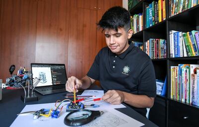 Abu Dhabi, United Arab Emirates - Mohamed Yalouh, 15, integrating the final CAD model of the ground based units. Khushnum Bhandari for The National