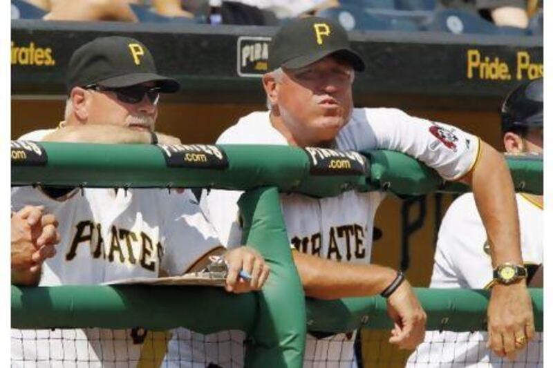 The Pittsburgh Pirates manager Clint Hurdle, right, and pitching coach, Ray Searage, stand in the dugout after the loss, and their 10th, to San Diego Padres on Sunday night.