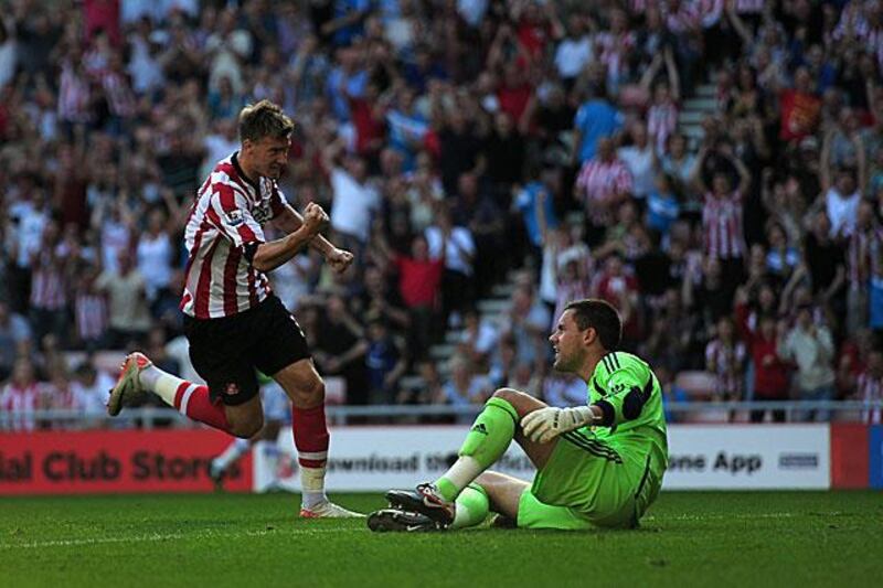 Nicklas Bendtner, left, celebrates scoring for Sunderland in their 2-2 draw with West Brom.

Jamie McDonald / Getty Images