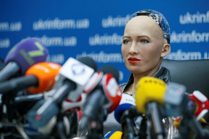 Social humanoid robot Sophia answers questions at a press conference in Kiev. Reuters