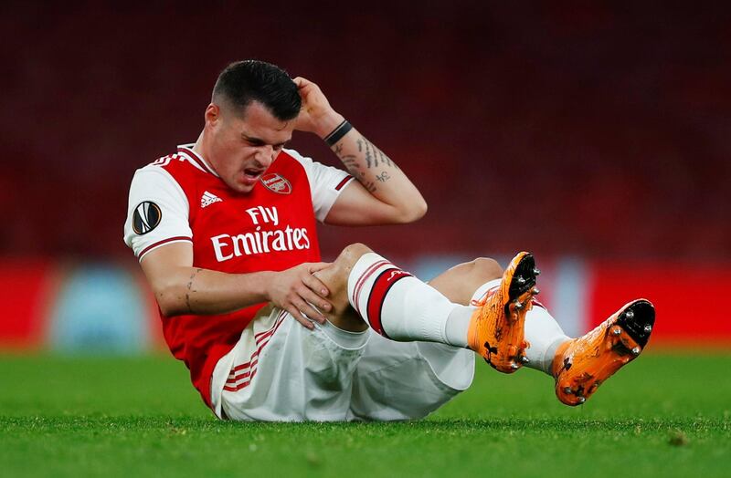 Soccer Football - Europa League - Group F - Arsenal v Eintracht Frankfurt - Emirates Stadium, London, Britain - November 28, 2019  Arsenal's Granit Xhaka reacts after sustaining an injury  REUTERS/Eddie Keogh