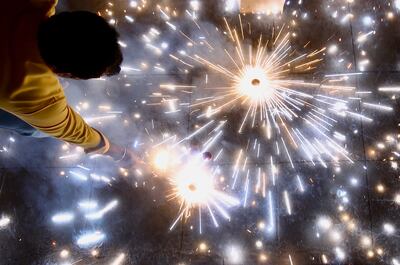 People burn crackers during Diwali, the festival of light, in Bengaluru. Concorde says it has witnessed a 40 per cent growth in sales year-on-year. EPA