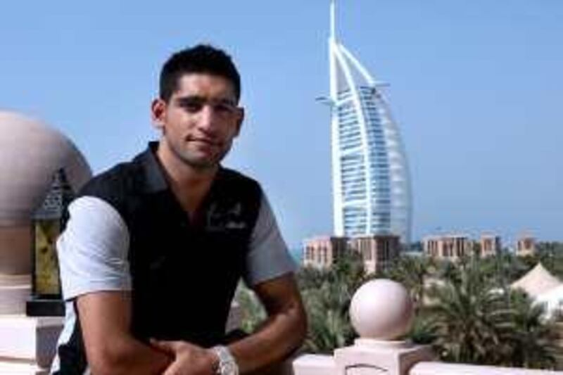 DUBAI - OCTOBER 4,2008 - UK boxer Amir Khan pose for a photograph during interview at Al Qasar hotel in Dubai. ( Paulo Vecina/ The National ) *** Local Caption ***  PV KHAN 8.jpgPV KHAN 8.jpg