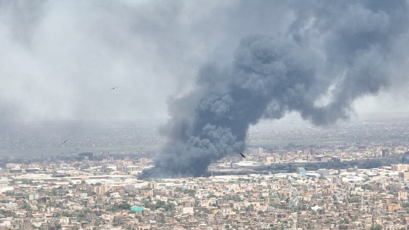 Clouds of black smoke billow over Khartoum as fighting continues on May 1. Reuters