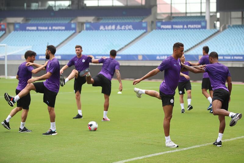 Manchester City players in action during training. Getty