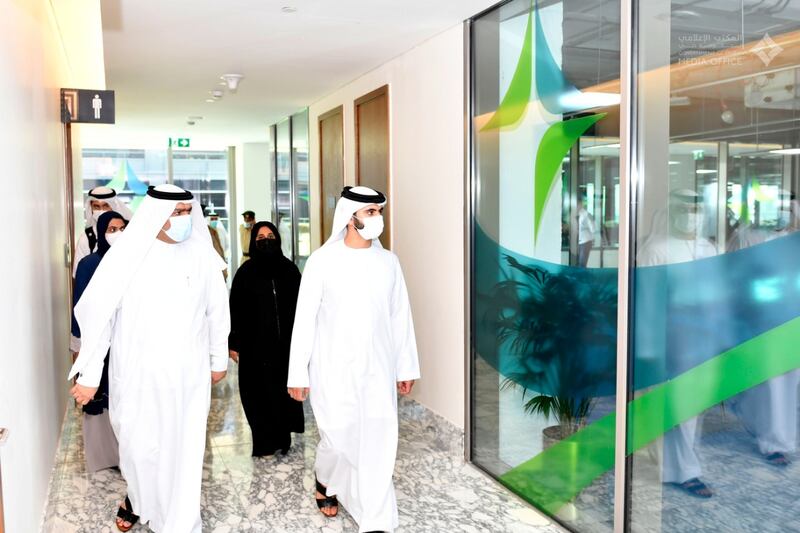 Sheikh Mansoor bin Mohammed, chairman of the emirate's Supreme Committee of Crisis and Disaster Management, visits a Covid-19 vaccination centre in Dubai on Sunday. Courtesy: Dubai Media Office