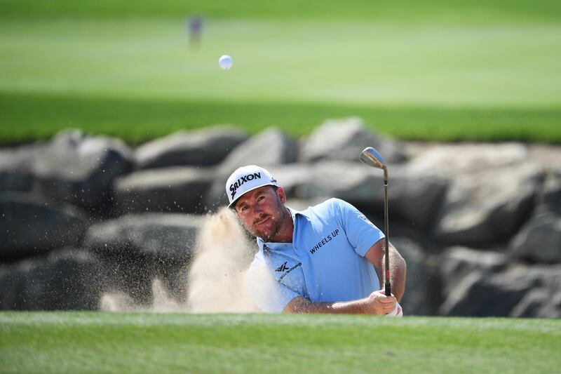 Graeme McDowell of Northern Ireland plays out of a bunker. Getty