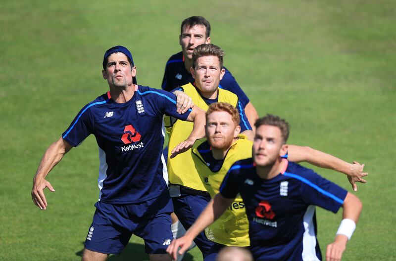 England players Alastair Cook, left, Toby Rowland-Jones, back, Liam Dawson, second back, Jonny Bairstow, second front, and Stuart Broad, bottom, play football during the nets session at Lord's on Wednesday. Nigel French / Press Association