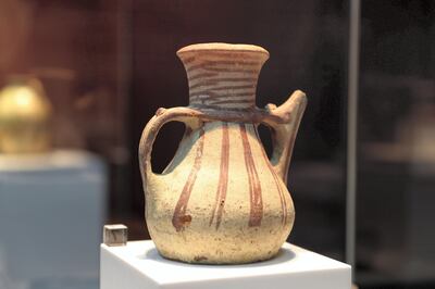 SHARJAH , UNITED ARAB EMIRATES , OCT 18   – 2017 :- Painted ceramic jar with spout , Julfar ware , RAK4284 on display during the exhibition of 40 Years of Archaeological Cooperation Between The United Arab Emirates and France held at Sharjah Archaeology Museum in Sharjah. (Pawan Singh / The National) Story by John Dennehy