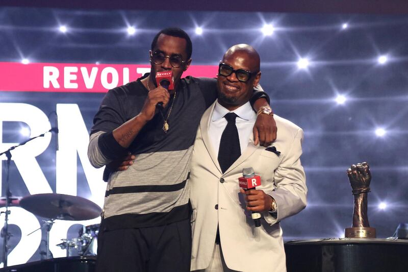 MIAMI BEACH, FL - OCTOBER 17:  Puff Daddy (L) and CEO of Motown Records, Andre Harrell onstage at the closing gala of the 2015 Revolt Music Conference at Fontainebleau Miami Beach on October 16, 2015 in Miami Beach, Florida.  (Photo by John Parra/Getty Images for REVOLT Music Conference)