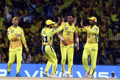 Deepak Chahar, center, Kedar Jadhav and Amabati Rayadu of Chennai Super Kings celebrate after taking the wicket of Nitish Rana Kolkata Knight Riders during the VIVO IPL T20 cricket match between Chennai Super Kings and Kolkata Knight Riders in Chennai, India, Tuesday, April 9, 2019. (AP Photo/R.Parthibhan)