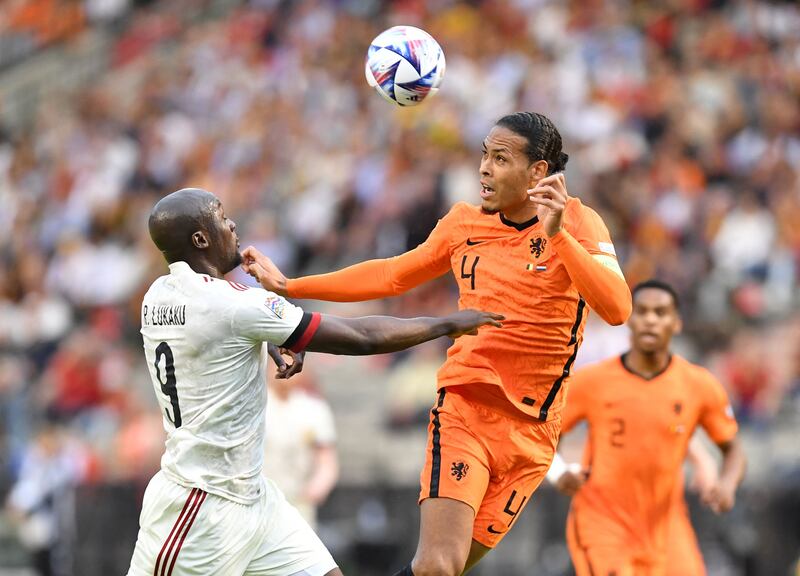 Belgium's Romelu Lukaku fights for the ball with Netherlands' Virgil van Dijk during their Nations League match in Brussels on June 3, 2022. AFP