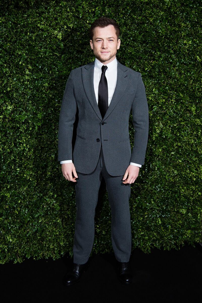 Taron Egerton attends the Charles Finch & Chanel pre-BAFTAs dinner at Loulou's, London on February 9. Getty Images