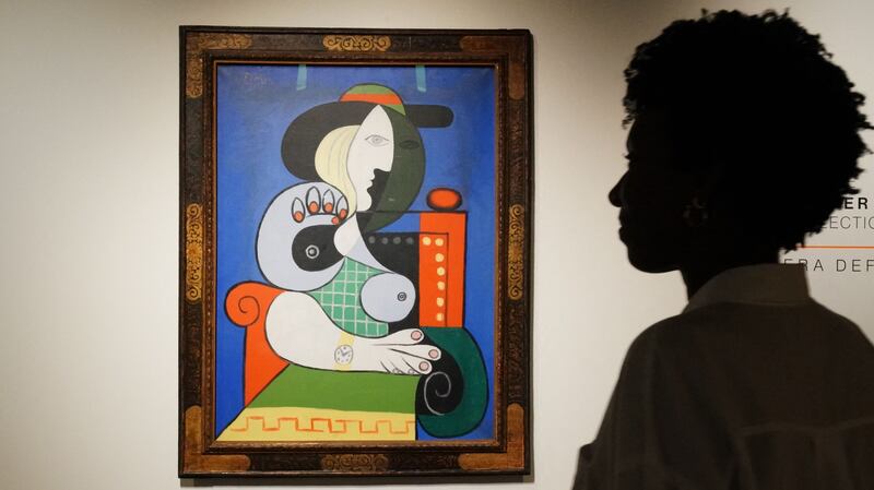Pablo Picasso’s painting Femme á la montre will be auctioned in November in Sotheby's New York and is expected to fetch $120 million. Photo: AFP