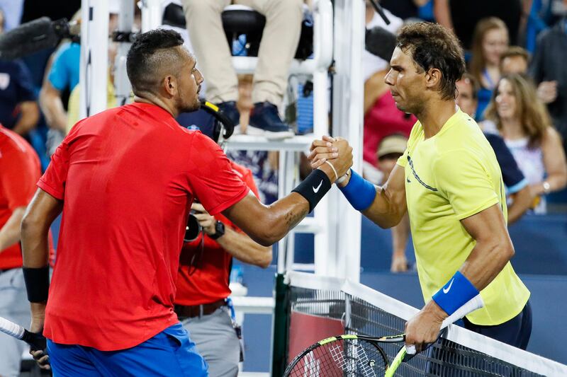 Nick Kyrgios, of Australia, shakes hands with Rafael Nadal, of Spain, after Kyrgios won their match at the Western & Southern Open tennis tournament, Friday, Aug. 18, 2017, in Mason, Ohio. Kyrgios won 6-2, 7-5. (AP Photo/John Minchillo)