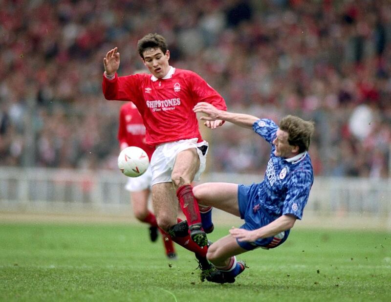 29 Mar 1992:  Nigel Clough of Nottingham Forest is tackled by Kevin Moore of Southampton during the Zenith Data Cup final at Wembley Stadium in London. Nottingham Forest won the match 3-2. \ Mandatory Credit: Shaun  Botterill/Allsport