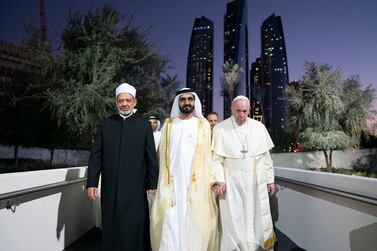 ABU DHABI, UNITED ARAB EMIRATES - February 04, 2019: Day two of the UAE papal visit - HH Sheikh Mohamed bin Rashid Al Maktoum, Vice-President, Prime Minister of the UAE, Ruler of Dubai and Minister of Defence (C), His Holiness Pope Francis, Head of the Catholic Church (R) and His Eminence Dr Ahmad Al Tayyeb, Grand Imam of the Al Azhar Al Sharif (L), arrive at the Human Fraternity Meeting, at The Founders Memorial. ( Mohamed Al Hammadi / Ministry of Presidential Affairs ) ---
