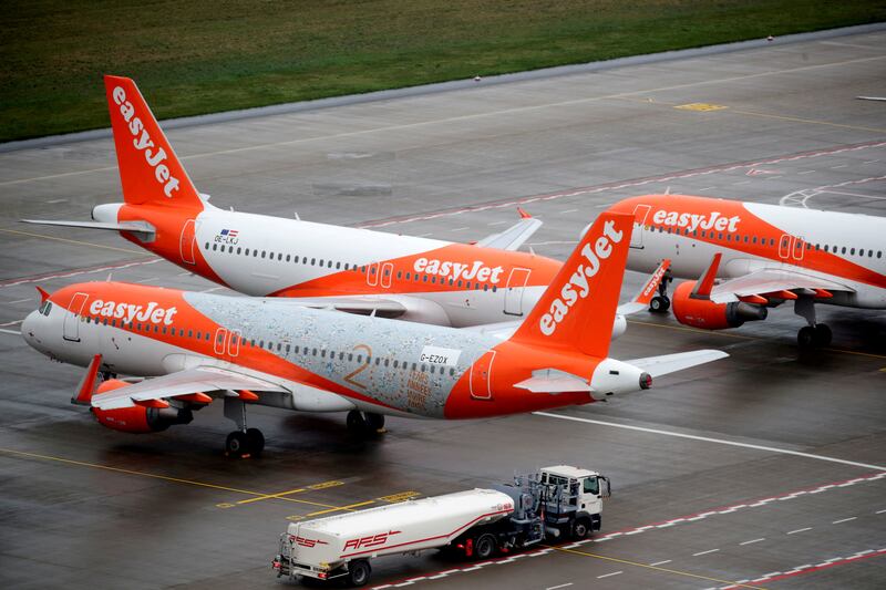 EasyJet airplanes are parked on the tarmac during the official opening of the new Berlin-Brandenburg Airport "Willy Brandt" in Schoenefeld, near Berlin, on October 31, 2020. Reuters