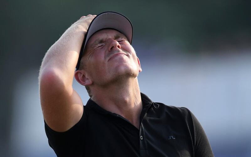 England's Matt Wallace reacts on the 18th hole during the final round of the DP World Tour Championship golf tournament in Dubai, United Arab Emirates. AP Photo