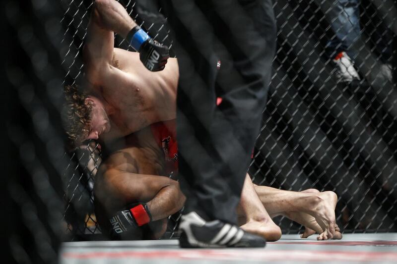 The One Fighting Championship "Reign Of Champions" mixed martial arts tournament held at the Dubai World Trade Center. Ben Askren beats Nobutatsu Suzuki in the first round of the Welterweight World Championship. Antonie Robertson / The National