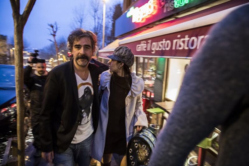 German-Turkish journalist Deniz Yucel and his wife, Dilek Mayaturk Yucel, are pictured in front of their home after Deniz Yucel was released from prison in Istanbul, Turkey, February 16, 2018. Depo Photos via REUTERS ATTENTION EDITORS - THIS PICTURE WAS PROVIDED BY A THIRD PARTY. NO RESALES. NO ARCHIVES. TURKEY OUT. NO COMMERCIAL OR EDITORIAL SALES IN TURKEY.