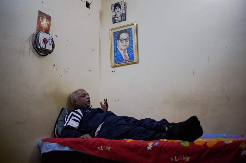 (FILES) In this file photo taken on December 2, 2014 the Indian head of the Love Commandos NGO Sanjoy Sachdev gestures as he talks during an interview with AFP at a shelter for couples who have left home to have 'love marriages' run by the Love Commandos in New Delhi. Delhi police have arrested the head of a group called Love Commandos which offered safe homes to runaway couples following allegations of extortion and abuse, officials said January 31, 2019. / AFP / Rebecca Conway
