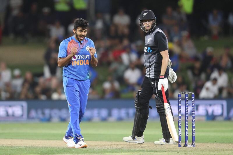 Shardul Thakur celebrates the wicket of New Zealand’s Mitchell Santner during the fifth T20 at the Bay Oval in Mount Maunganui on Sunday. AFP