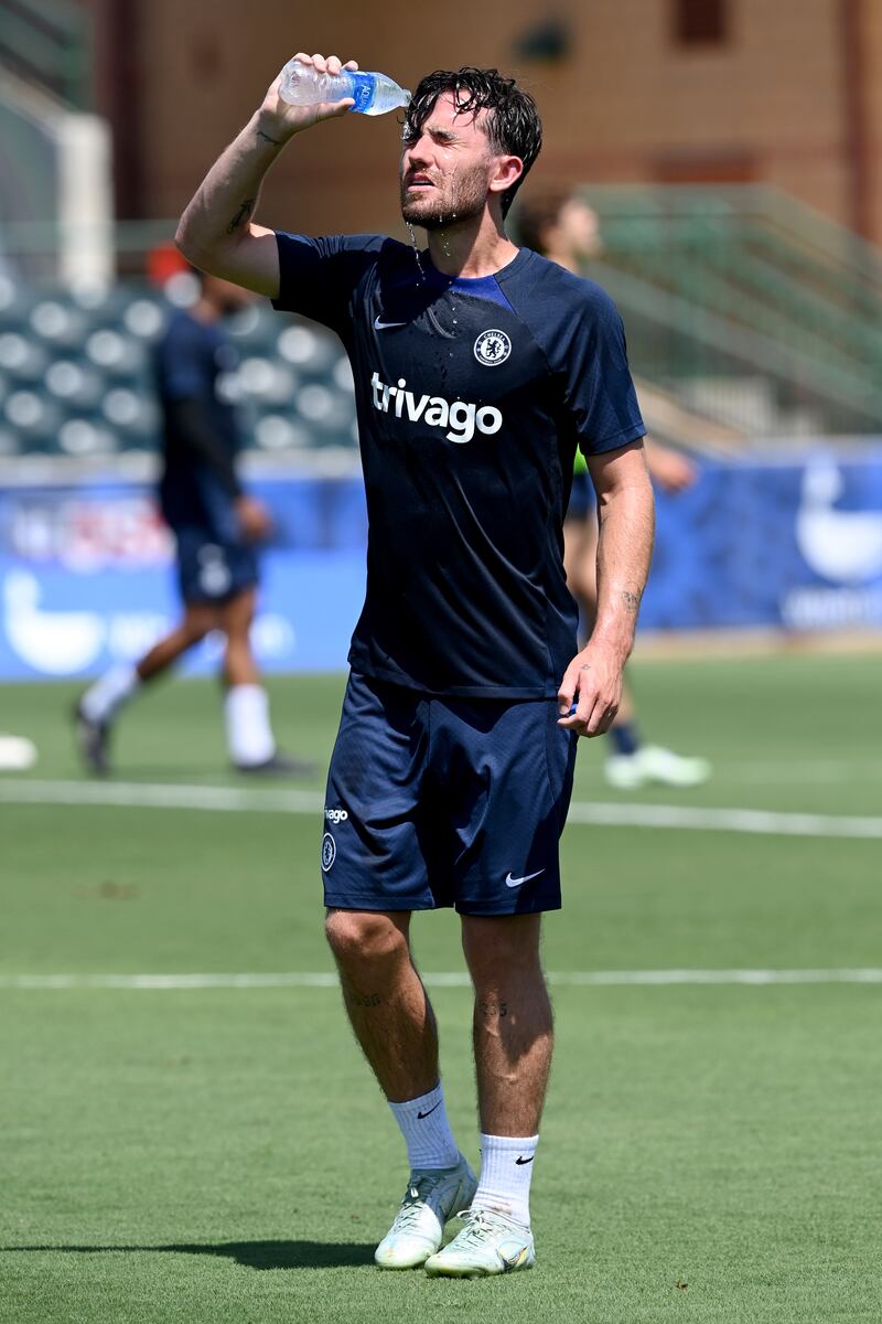 Ben Chilwell cools down with water during the workout. 