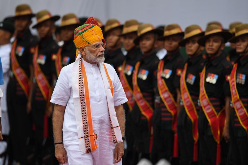 Narendra Modi receives a guard of honour at the Red Fort. AFP