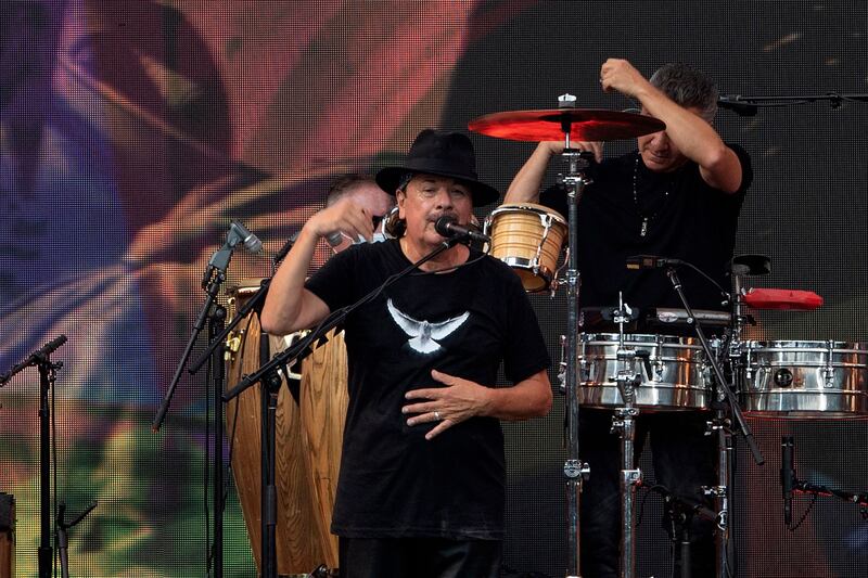 Carlos Santana performs during the 'We Love NYC: The Homecoming Concert' in Central Park. AFP